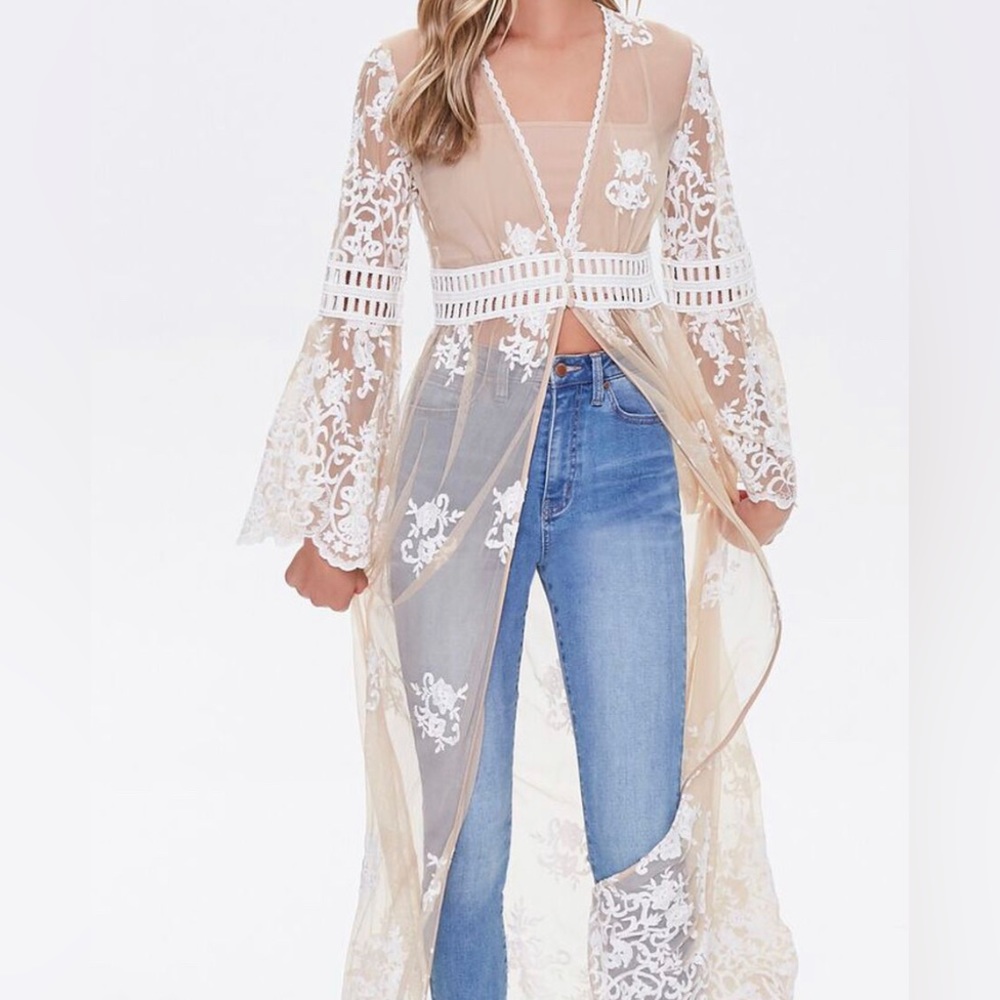 Woman’s sheer crochet cover up